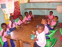 Pupils drink porridge - Mikoroshoni Primary School 